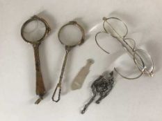 Two lorgnettes, spectacles,
