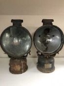 A pair of antique ship's spot lights