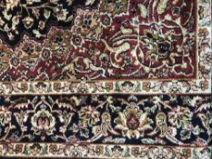 A fringed silk finished Keshan rug,