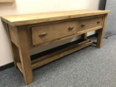 A pine farmhouse work table fitted two drawers