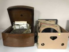 A mid twentieth century mahogany cased Pye 'Black Box' record player together with a box of