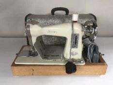 Jones electric sewing machine in case