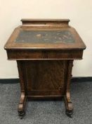 A late Victorian inlaid walnut Davenport