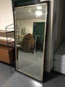 A large antique hall mirror