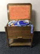 An oak sewing trolley