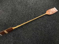 A wooden Kober Weltmeister paddle