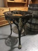 A cast iron Britannia bar table base