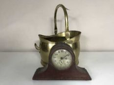 A brass coal bucket together with an early twentieth century mahogany mantle clock