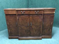 A Strongbow furniture inlaid yewwood four door sideboard