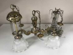 An early 20th century brass ceiling light with brass drops,