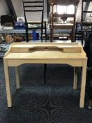 A contemporary beech effect desk