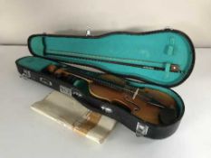 A Lark half size violin and bow in carry case