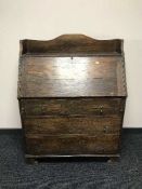 An Edwardian oak bureau