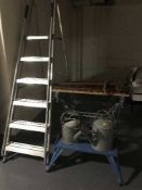A pair of aluminium folding steps, work bench,
