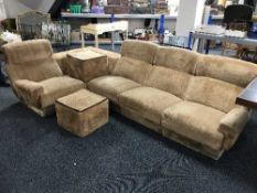 A 1960's four seat corner suite with coffee table and two footstools