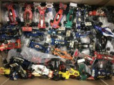A quantity of Corgi and Matchbox die cast motor racing cars