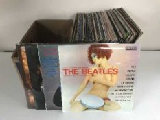 A box of LP records - musicals, Eric Clapton,