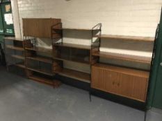 A four piece Ladderax style wall unit and wall shelf