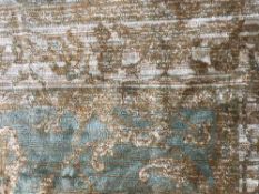 A fringed silk finished Zeigler rug,