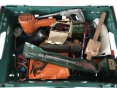 A crate of assorted power tools, attachments, hand tools,