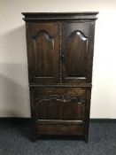 A 19th century stained pine hall cupboard