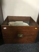 A large mahogany drawer with brass handle