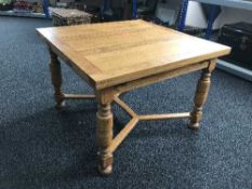 A square oak pull out dining table