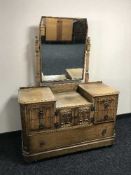 An early 20th century oak dressing table