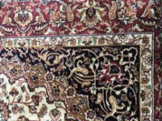 A fringed silk finished Keshan rug,