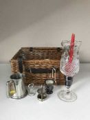 A wicker picnic basket of plated ware, enamelled commemorative mug,