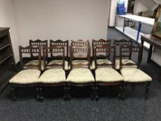 A set of ten Edwardian upholstered dining chairs