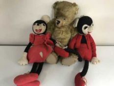 A basket of vintage teddy bear and Mickey & Minnie mouse soft toy