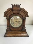 An oak late nineteenth century American mantle clock by Ansonia Clock company New York