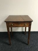 A Victorian mahogany side table fitted with a drawer