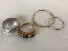 Two 9ct gold rings and two odd 9ct gold earrings