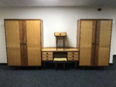 A five piece Butilux bedroom suite