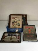 A box of seven framed pictures including Cadbury's and Jacobs advertising,