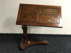 A nineteenth century mahogany adjustable bed table by Carters of London