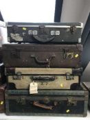 Four mid 20th century luggage cases