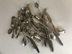A basket of silver and silver handled cutlery (approximately 43 pieces)