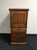An antique mahogany cabinet fitted with four drawers