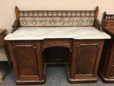 A Victorian mahogany wash stand with marble top