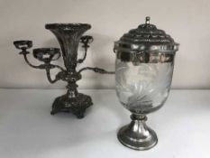 A plated epergne and a plated and glass lidded candle holder