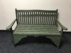 A painted wooden garden bench
