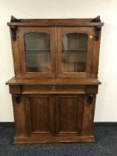A Victorian mahogany bookcase with cupboard beneath