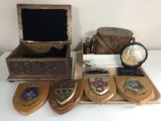 A tray of carved oak trinket box, four wooden plaques, pair of binoculars in case,