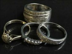 Four various 9ct gold rings, all set with diamonds, gross weight 13.