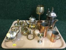 A tray of plated teapot, copper and brass kitchen measures,