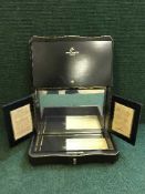 A Remy Martin cognac box with key