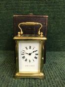 A Mappin & Webb carriage clock in travel case